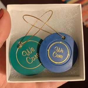 Vintage “We Care” sobriety coin earrings